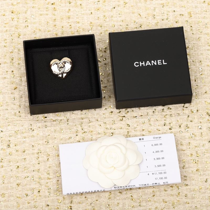Ch*el brooches